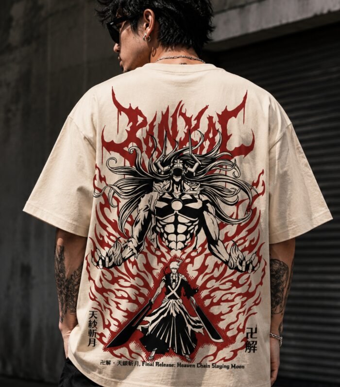 Man wearing LURI Bankai Final Release graphic oversized t-shirt back print – Bleach anime Ichigo and Zangetsu on cream Supima cotton